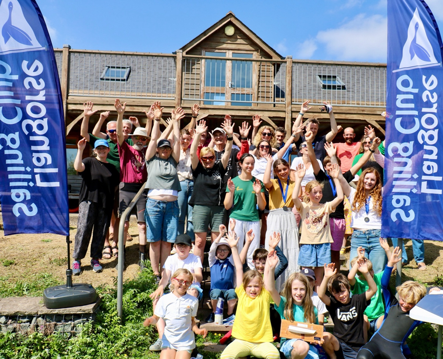 Trainees, instructors and parents in front of LSC club house